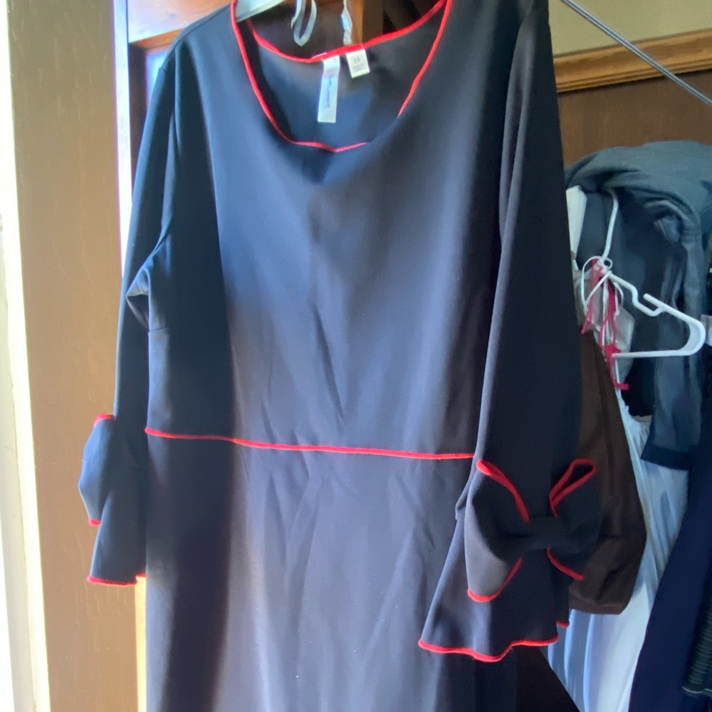 Tacera Black and Red dress with bows on sleeve.